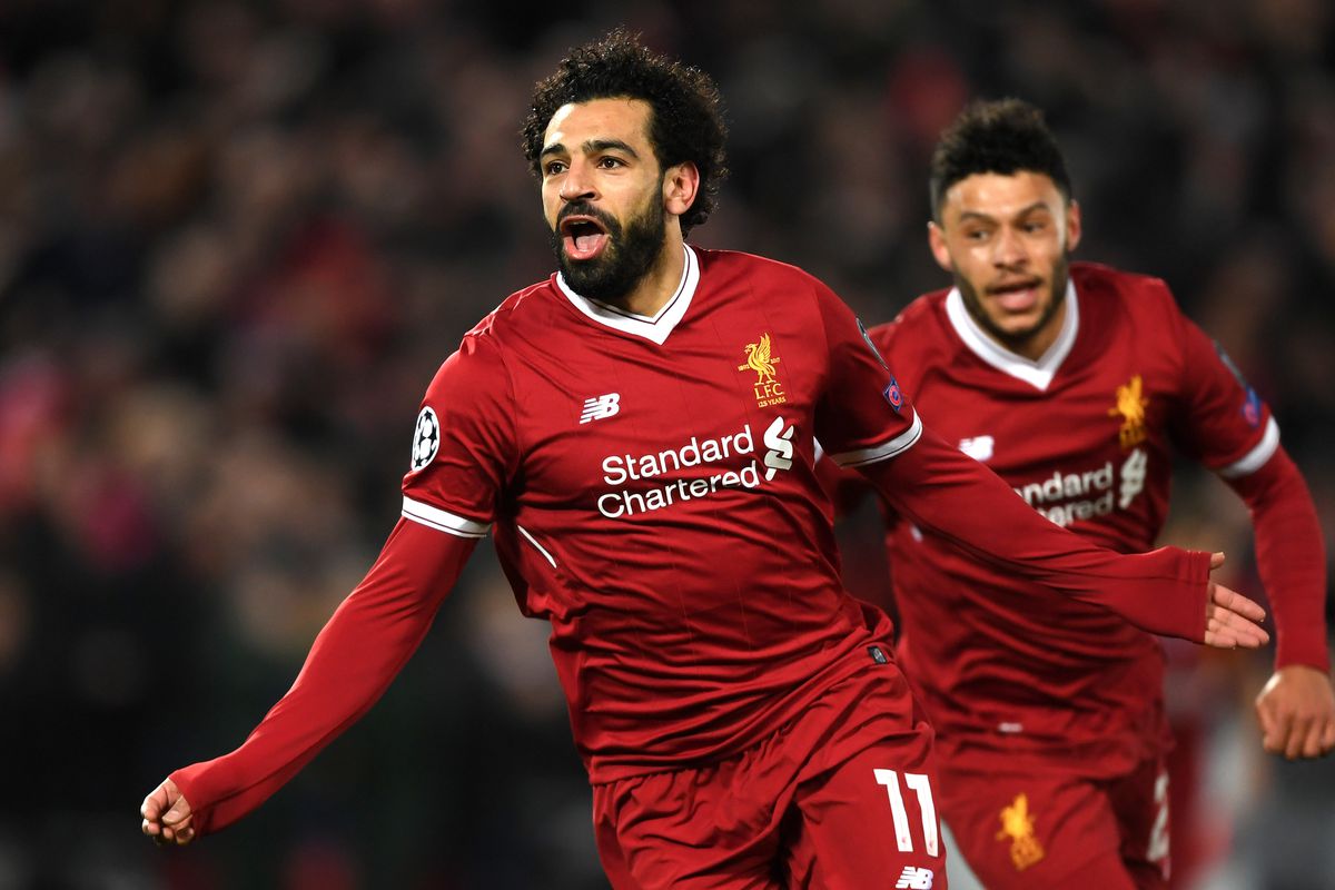 Liverpool Sponsors Partners brand associations advertisements logos ads Standard Chartered